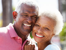 happy couple free from diseases your dentist can detect