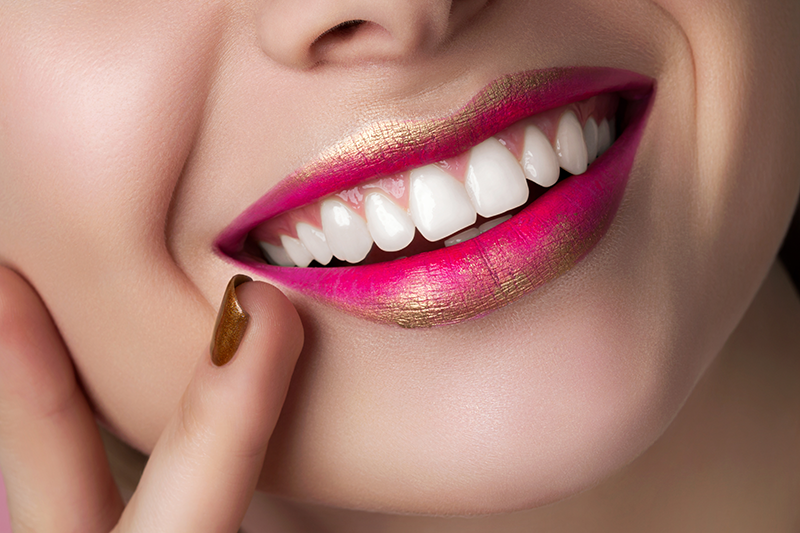 Woman smiling after a dental spa day